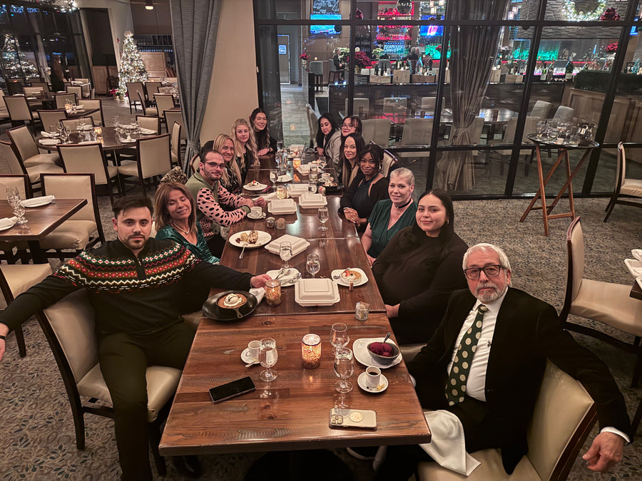 The Kyriacou team at a holiday dinner